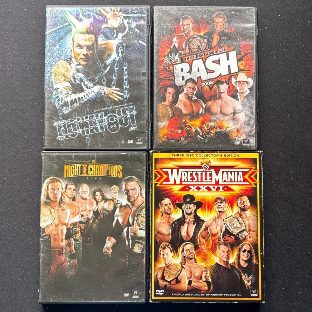 WWE DVD Collection with Black, Red, and Gold Covers